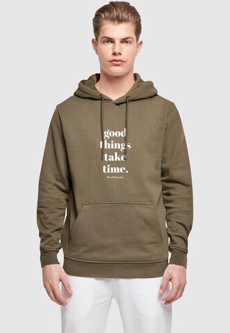 Merchcode Sweatshirt 'Good Things Take Time' in Green: front