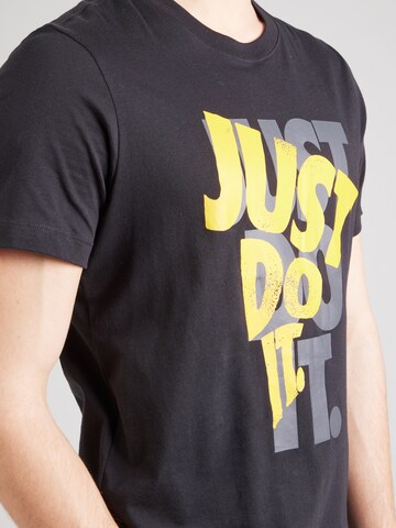 Nike Sportswear - Camisa em preto