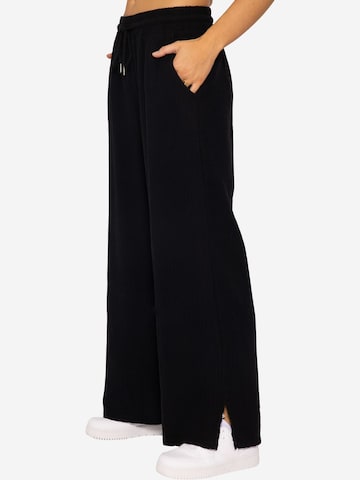 SASSYCLASSY Loose fit Trousers in Black