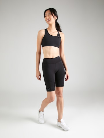 Slimfit Pantaloni sportivi 'BEAT SPRINTERS' di Newline in nero