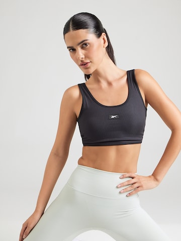 Reebok Бюстие Спортен сутиен в черно: отпред