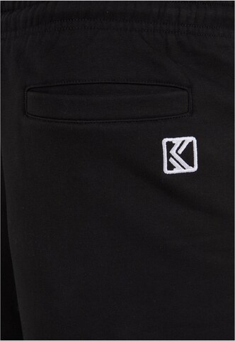 Tapered Pantaloni di Karl Kani in nero