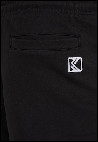 Karl Kani Tapered Pants in Black