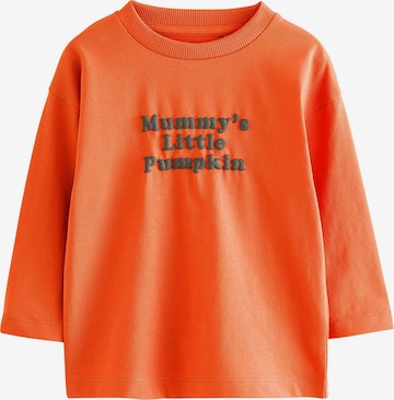 Next Shirt in Oranje: voorkant
