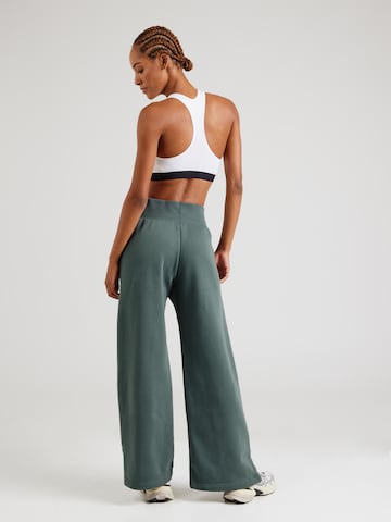 NIKEWide Leg/ Široke nogavice Hlače 'Phoenix Fleece' - zelena boja