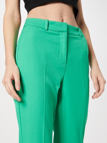 Slimfit Pantaloni con piega frontale di COMMA in verde