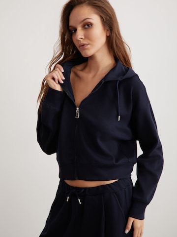 Veste de survêtement Grimelange en bleu