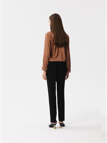 Stylove - Blusa en naranja