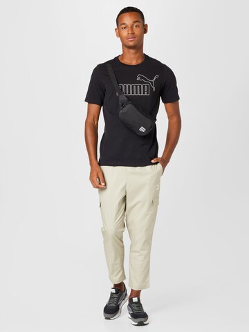 T-Shirt fonctionnel PUMA en noir