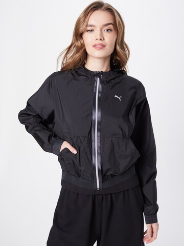 PUMA Performance Jacket 'Stardust' in Black: front