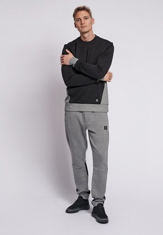 Hummel - Camiseta deportiva 'Tropper' en negro