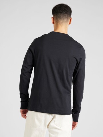 T-Shirt 'BIG SWOOSH' Nike Sportswear en noir