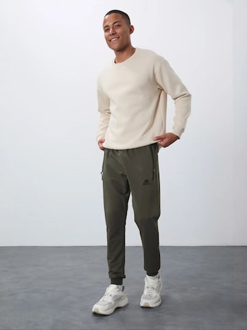 Regular Pantalon de sport Tommy Life en vert