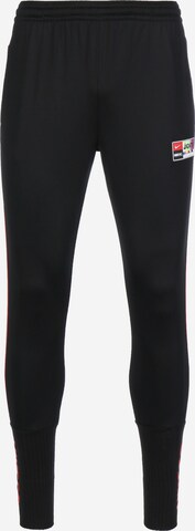 Effilé Pantalon de sport NIKE en noir : devant