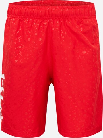 Regular Pantalon de sport UNDER ARMOUR en rouge : devant