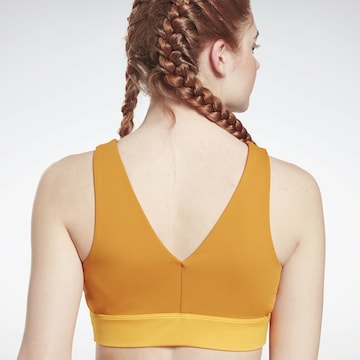 Reebok Bustier Sportmelltartók - narancs