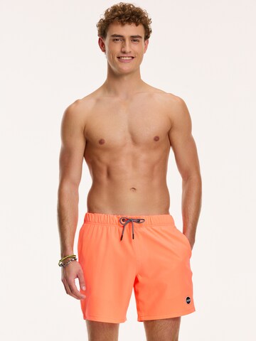 Shiwi Kratke kopalne hlače 'MIKE' | oranžna barva: sprednja stran