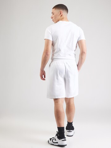 Karl Kani - Loosefit Pantalón en blanco