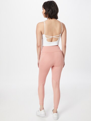 Skinny Pantaloni sport de la PUMA pe roz