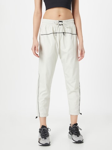 UNDER ARMOUR Tapered Sports trousers in Grey: front