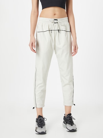 UNDER ARMOUR - Tapered Pantalón deportivo en gris: frente