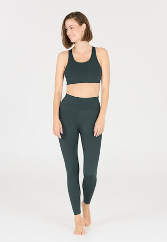 Athlecia Skinny Sports trousers 'FRANZ' in Green