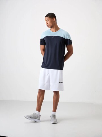 T-Shirt fonctionnel Tommy Life en bleu
