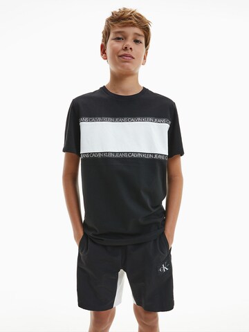 Calvin Klein Jeans - Camiseta en negro: frente