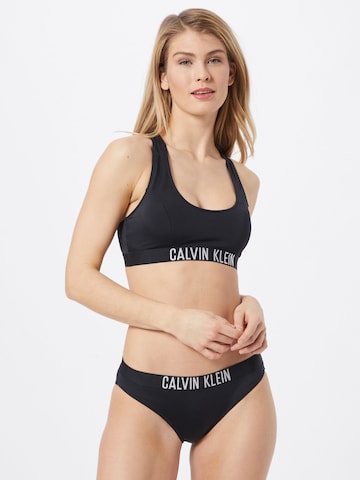 Calvin Klein Swimwear Bygelfri Bikiniöverdel i svart