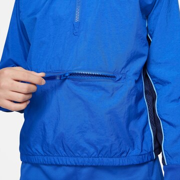 Veste de sport NIKE en bleu