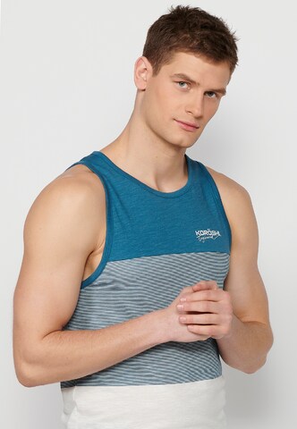 Tricou de la KOROSHI pe albastru