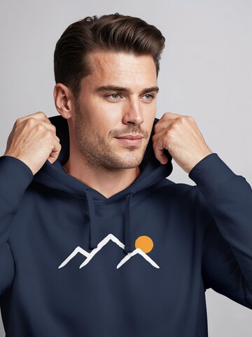 Neverless Sweatshirt 'Mountain Sun' in Blue