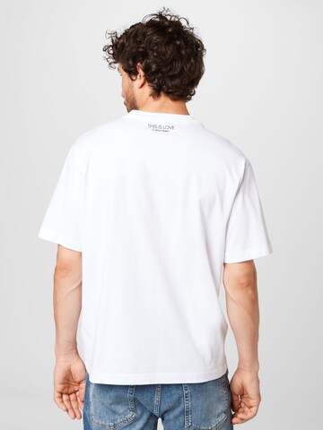 Maglietta 'PRIDE' di Calvin Klein in bianco