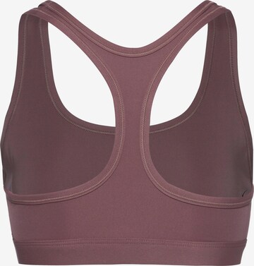 NIKE Bustier Biustonosz sportowy w kolorze fioletowy