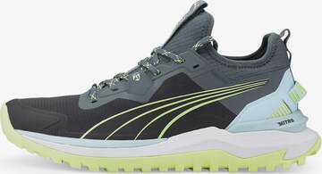 PUMA Loopschoen 'Voyage' in Grijs: voorkant