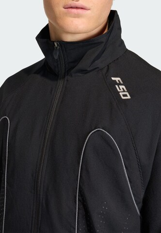ADIDAS ORIGINALS Between-Season Jacket 'F50' in Black