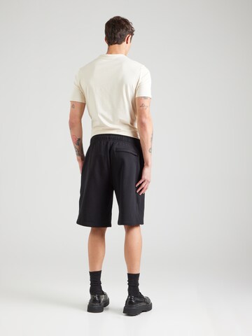 Loosefit Pantaloni di GUESS JEANS in nero