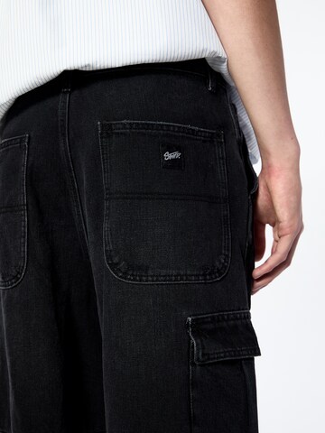 Loosefit Jeans cargo di Pull&Bear in nero