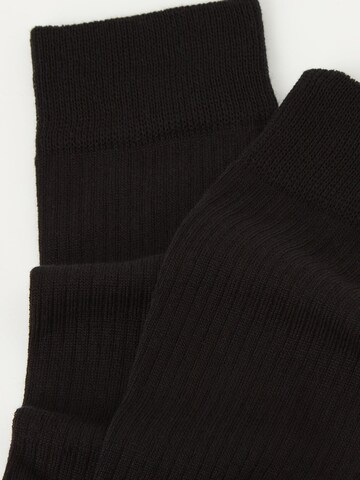 CALZEDONIA Socks in Black