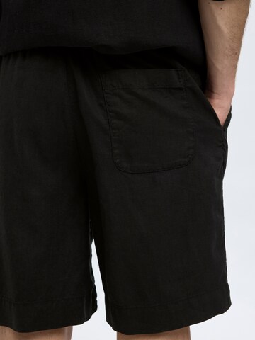 SELECTED HOMME Loosefit Nadrág 'SLHMAGNUS' - fekete