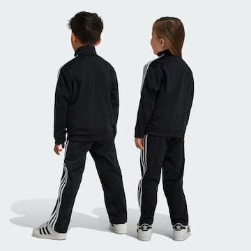 ADIDAS ORIGINALS - Ropa para correr 'Adicolor Firebird' en negro