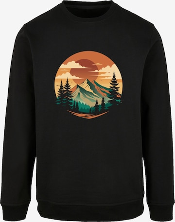 Pull-over 'Sonnenuntergang Berglandschaft' F4NT4STIC en noir : devant