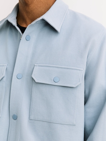 Coupe regular Veste mi-saison Next en bleu