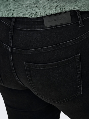 Skinny Jeans 'CARWilly' di ONLY Carmakoma in nero