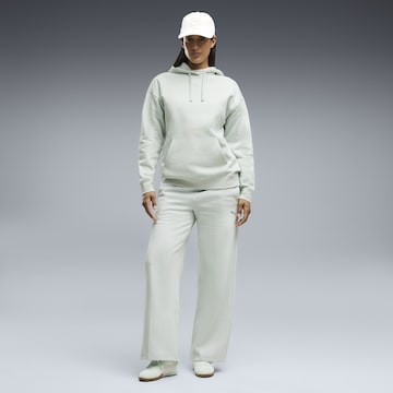 PUMA Wide leg Broek 'Essentials ' in Groen