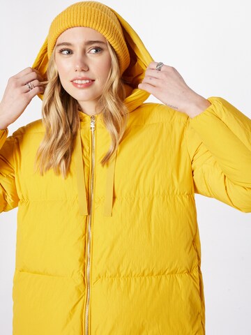TOMMY HILFIGER Wintermantel in Geel