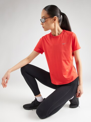 NIKE Functioneel shirt 'SWIFT' in Oranje