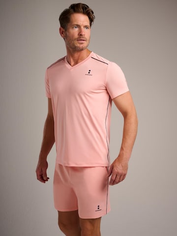 nordicdots - Camiseta funcional 'Performance V-Tee' en naranja