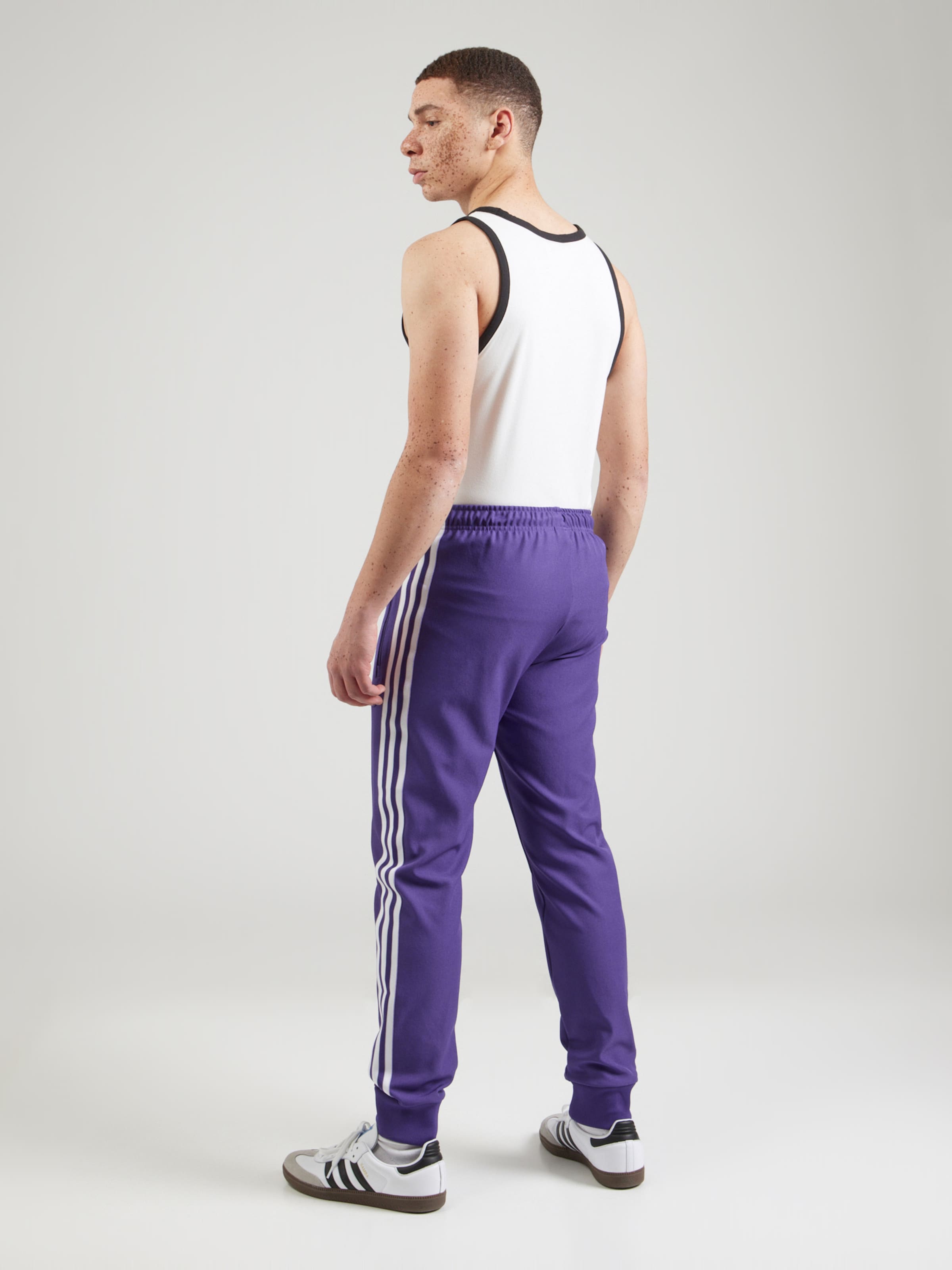 purple adidas pants mens