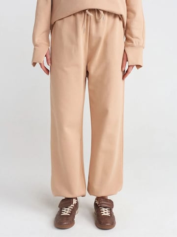 Pantalon de sport Dilvin en beige : devant